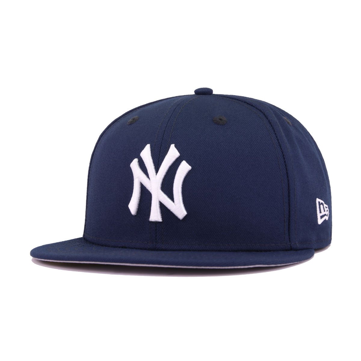 blue fitted hat with patch