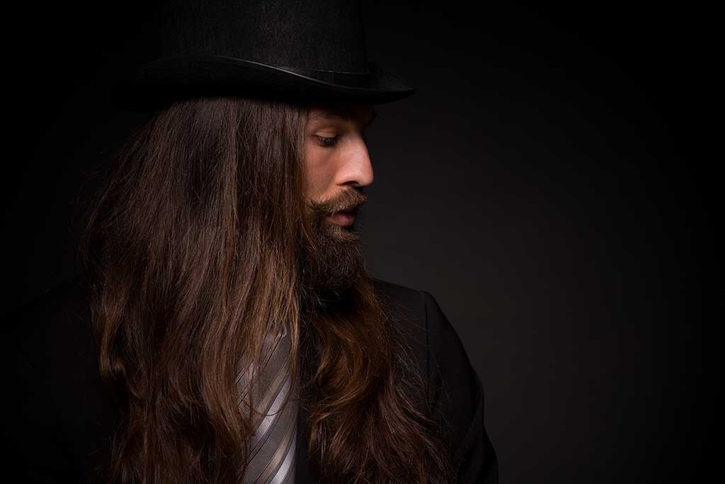 Stylish Ways To Wear A Hat With Long Hair For Guys & Girls