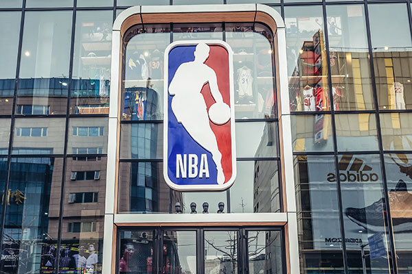 Beijing, China - February 6, 2019: Facade of NBA shop located on a famous Wangfujing shopping street in Beijing city