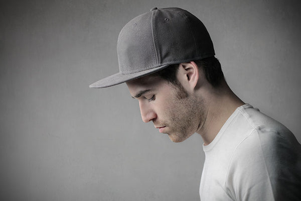 Here's How Wearing A Hat Can Boost Your Confidence