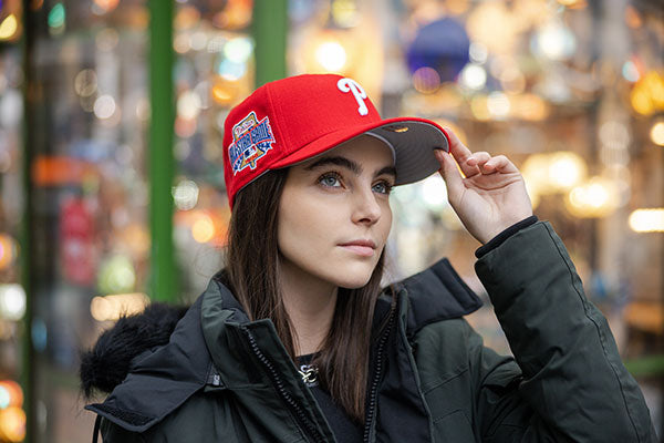 Lady with red a cap.