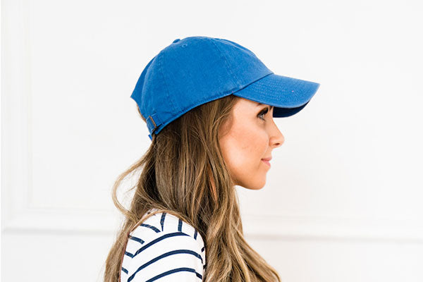 Mom style baseball cap and striped dress